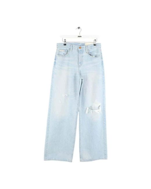 Jeans flare / larges Pantalon large bleu Calvin Klein en coloris Blue