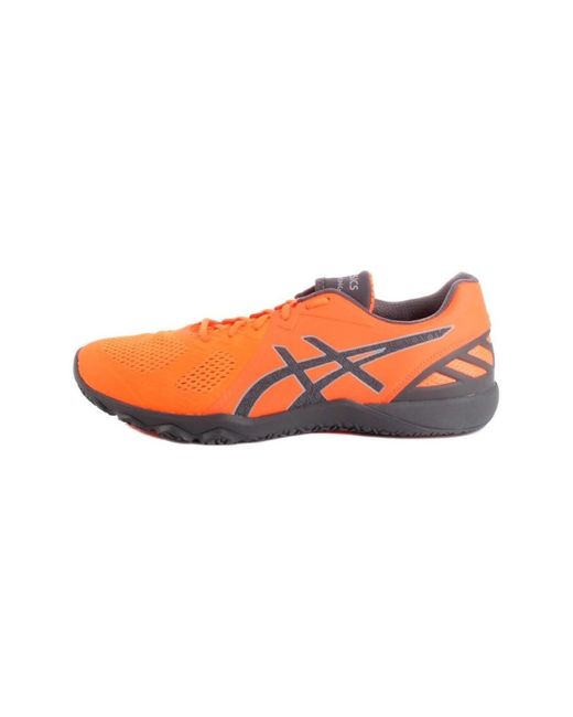 orange asics football boots
