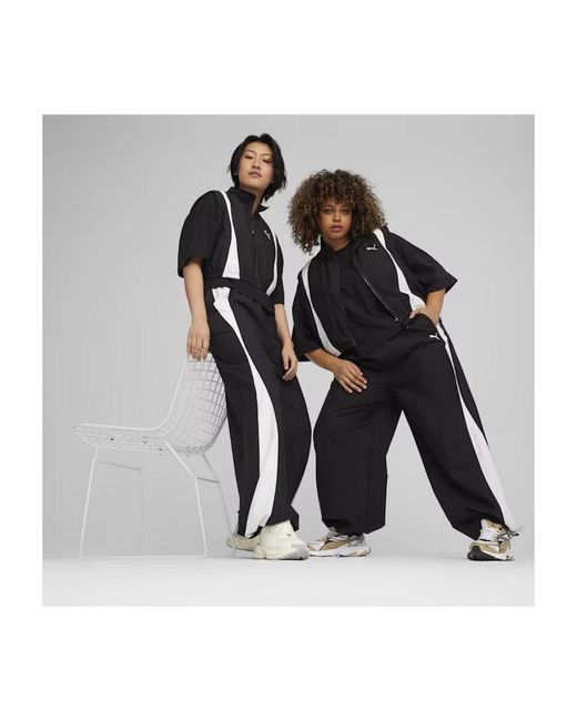 Veste DARE TO WOVEN VEST PUMA en coloris Black