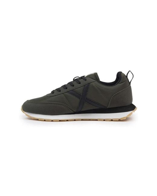Baskets basses Munich pour homme en coloris Black