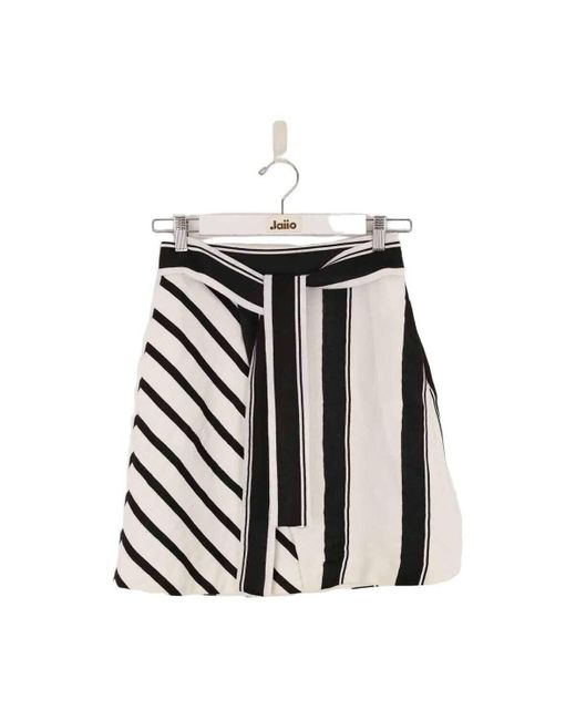 Jupes Mini jupe en coton Maje en coloris Black
