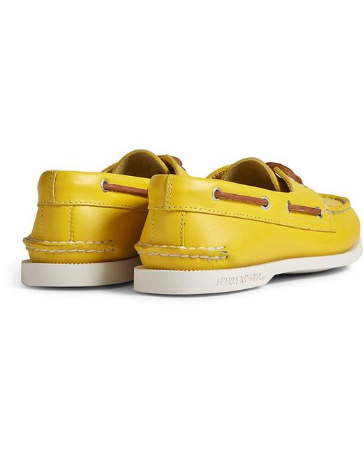 yellow sperry boat shoes