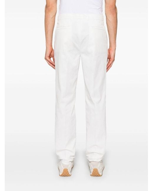 Brunello Cucinelli White Garment-Dyed Leisure Fit Pants for men