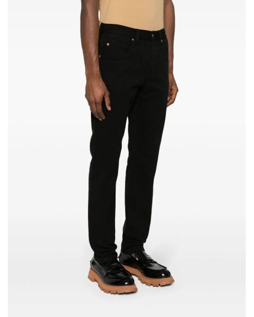 Jeans con morsetto di Gucci in Black da Uomo