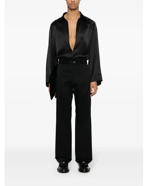 | Pantaloni cargo in cotone con tasche e ricamo | male | NERO | 50 di Versace in Black da Uomo