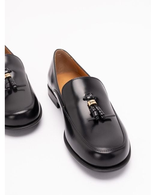 Tod's White Loafers