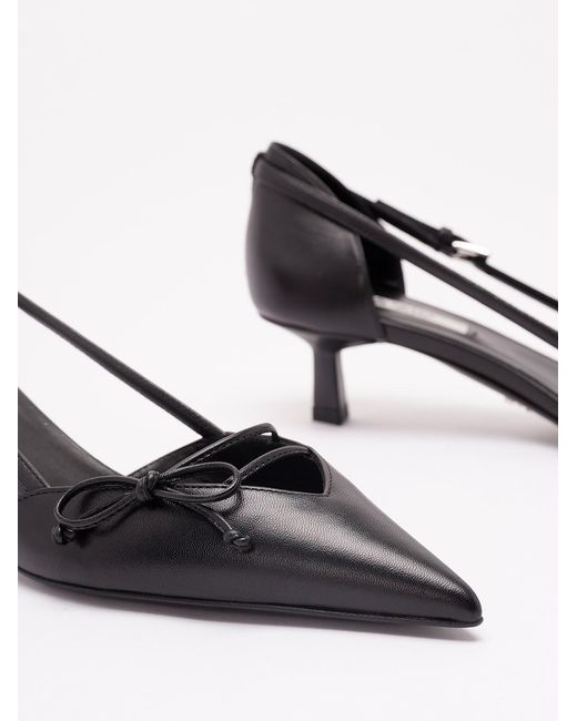 Prada White Leather Pumps