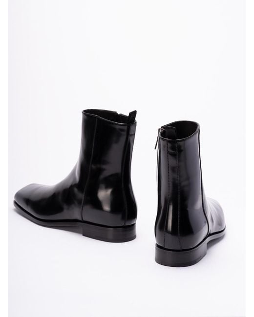 Brushed Leather Ankle Boots di Prada in Black da Uomo