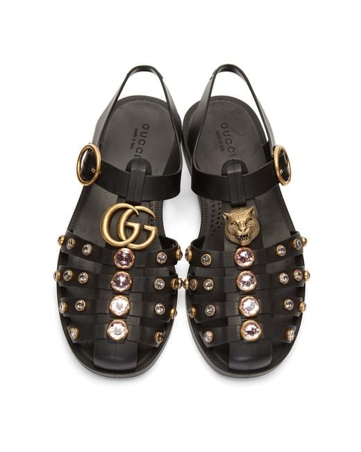 Gucci black glossy deals rubber sandals