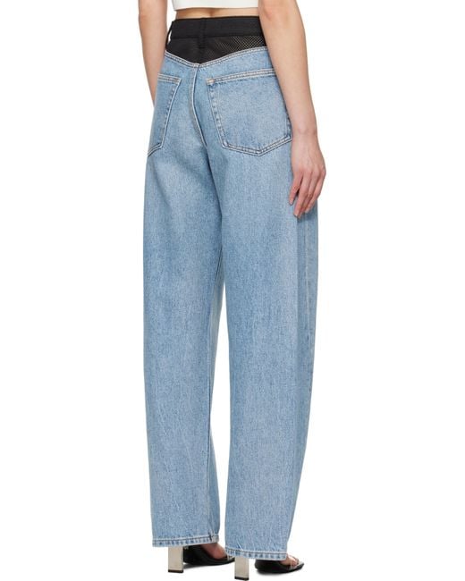 デニム・ジーパン Alexander Wang Mesh Back Balloon Jeans With Logo Logo-Embossed Balloon Jeans in VINTAGE LIGHT INDIGO