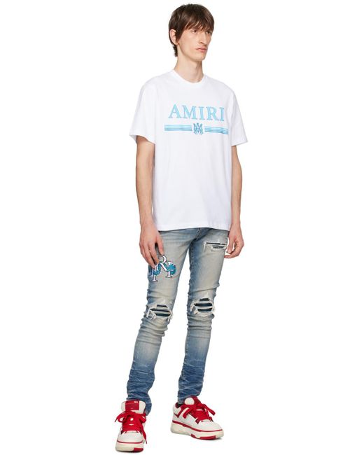 Amiri Blue Mx1 Embroidered Jeans for men