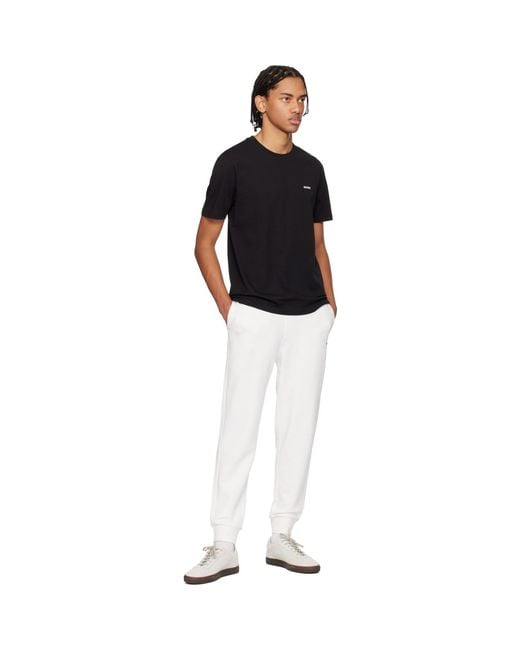 HUGO Black Cuffed Logo Print Sweatpants for men