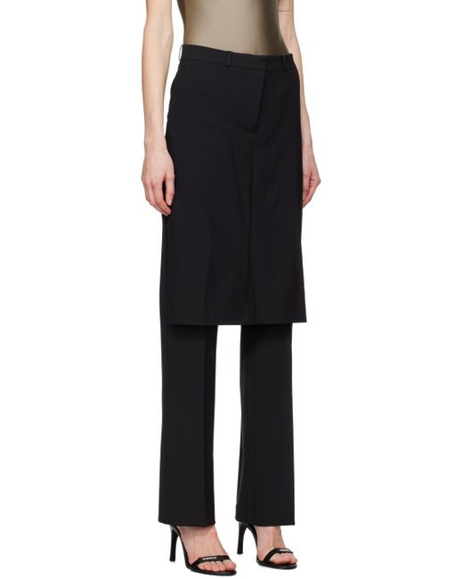 Pantalon noir à empiècement superposé de style jupe Coperni en coloris Black