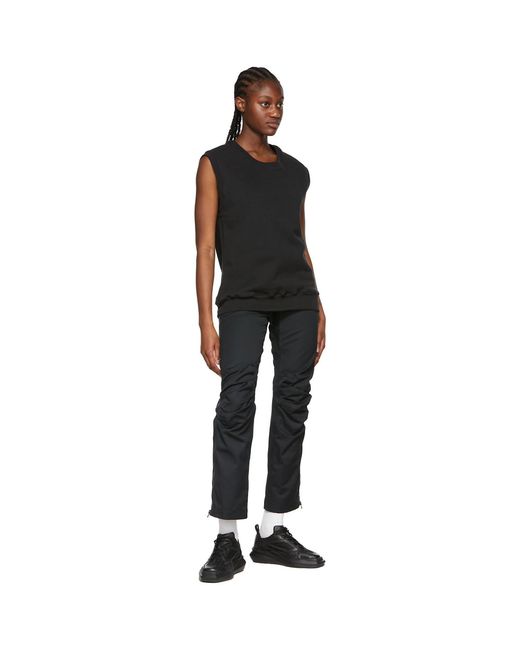 Pull molletonné noir en coton GR10K en coloris Black