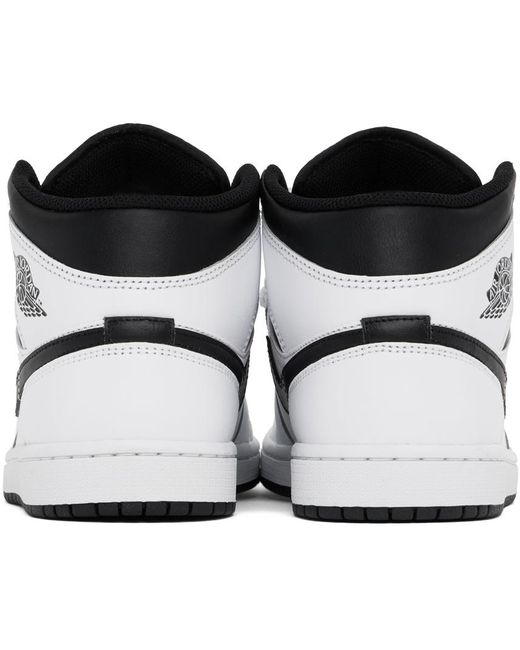 Nike Air Jordan 1 Mid Sneakers in Black for Men Lyst UK
