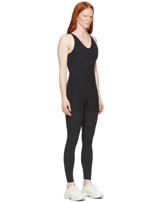 Nike Yoga Luxe 7/8 Jumpsuit in Black | Lyst Canada
