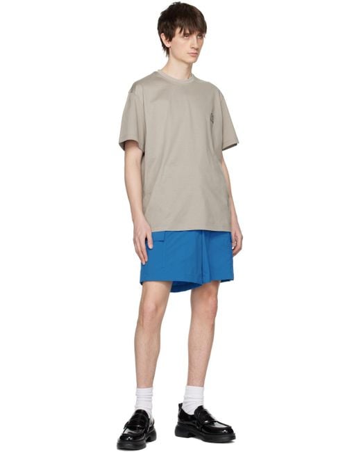 Wooyoungmi Blue Hardware Shorts for men