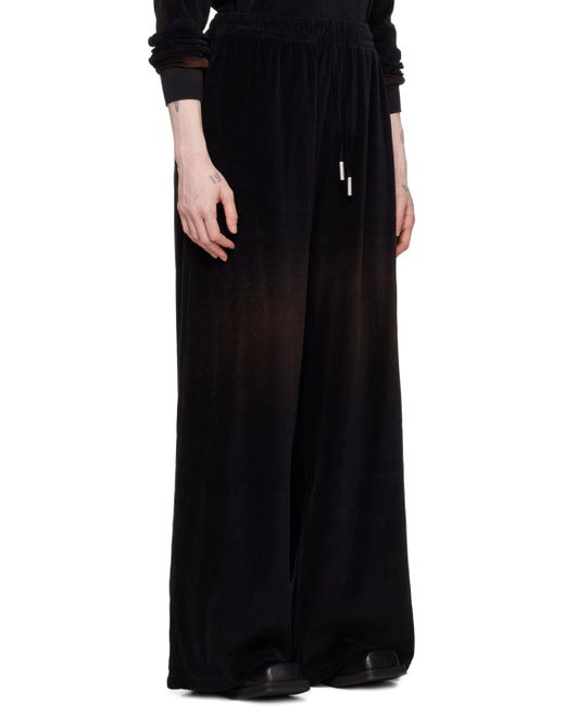 Pantalon de détente noir à logo gaufré Acne en coloris Black