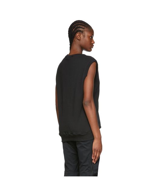 Pull molletonné noir en coton GR10K en coloris Black
