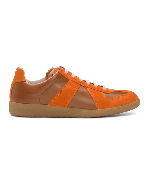 brown and orange sneakers