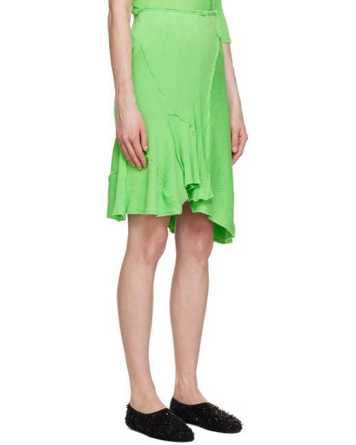 TALIA BYRE Green Asymmetric Miniskirt