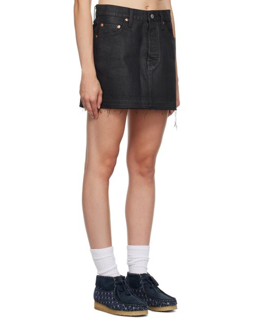 Mini-jupe icon noire en denim Levi's en coloris Black