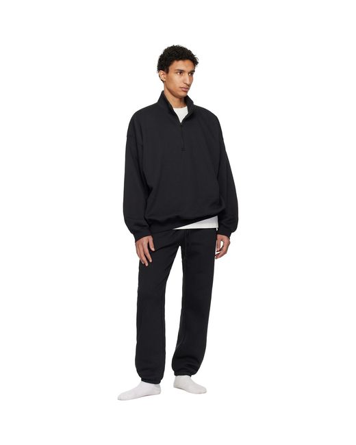 Skims Black Fleece Lounge Relaxed Quarter Zip Track Jacket for men