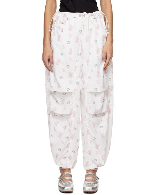 HELLO KITTY X YY PARACHUTE PANTS, WHITE