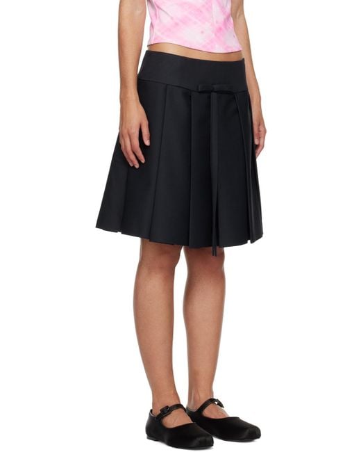 Sandy Liang Pleated Bow Applique Midi Skirt in Black Lyst UK