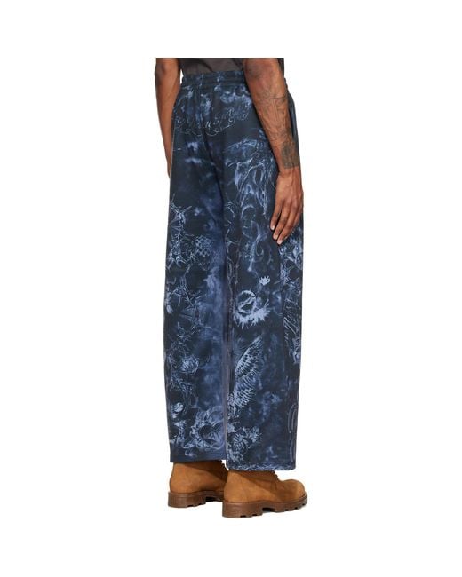 we11done Blue Tattoo Printed Sweatpants for men