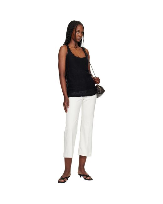 Totême White Kick Flare Jeans