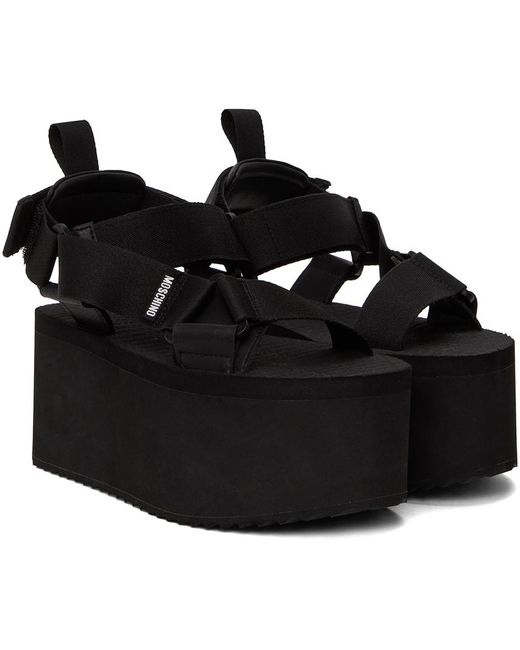 Sandales à talon compensé noires Moschino en coloris Black
