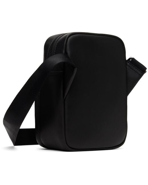 Petit sac à bandoulière noir à monogrammes gaufrés Lacoste pour homme en coloris Black