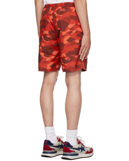 A Bathing Ape Red Camo Shark Reversible Shorts for men