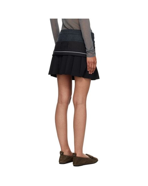 ANDERSSON BELL Black Inside Out Pleats Miniskirt