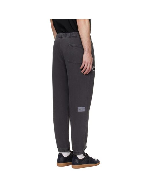 Aape By A Bathing Ape Black 'Aapenow' Moonface Jogger Sweatpants for men