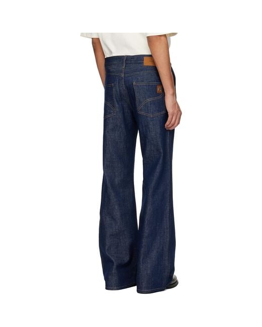 Amiri Blue Raw Boot Cut Jeans for men