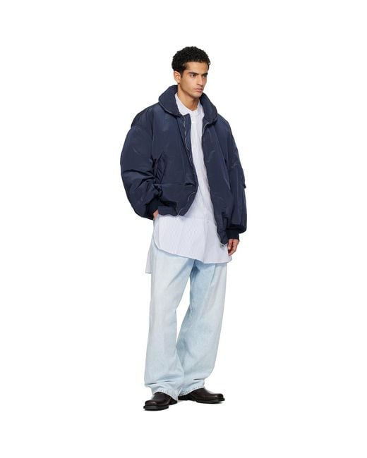 Hed Mayner Blue Light Wash Pleated Jeans for men