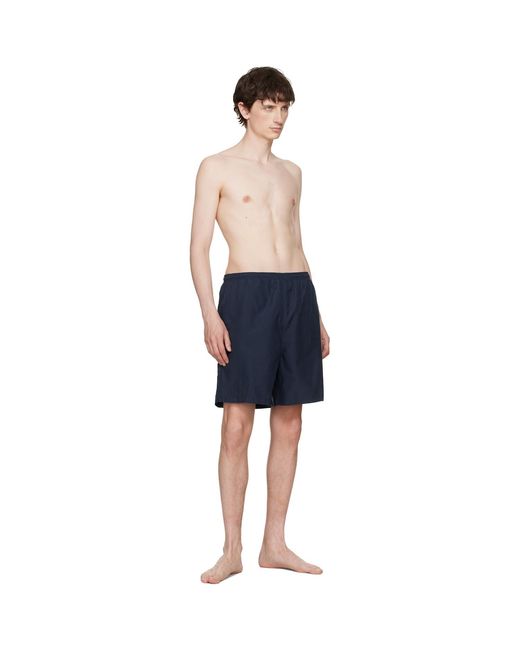 AMI Blue Long Plain Swim Shorts for men