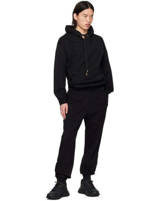 Pantalon de survêtement noir à logo brodé Versace pour homme en coloris Black