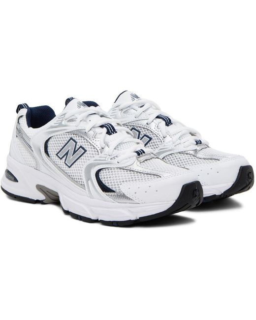 new balance white & silver 530 sneakers