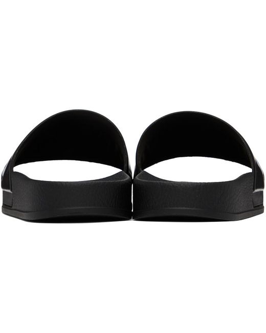 Sandales à enfiler noires en pvc à logos Moschino en coloris Black