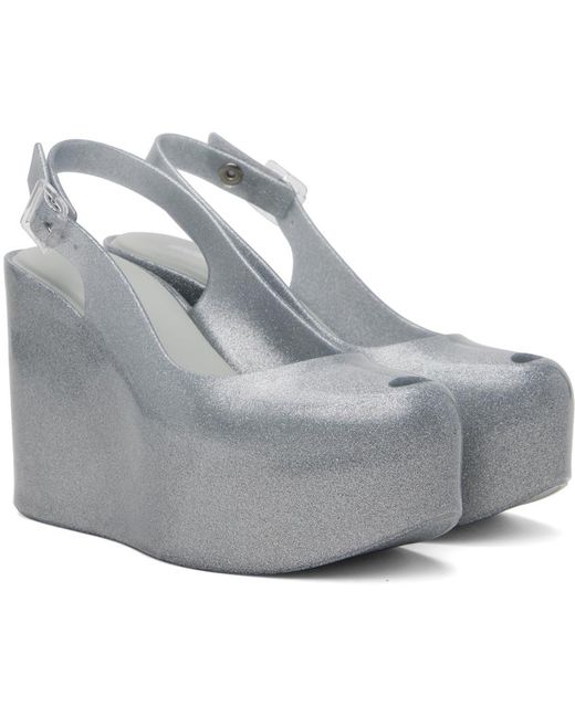 Chaussures à talon compensé groovy argentées Melissa en coloris Gray