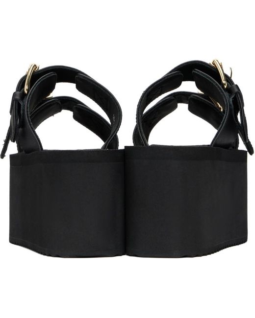 Sandales compensées noires à boucles à logo Moschino en coloris Black