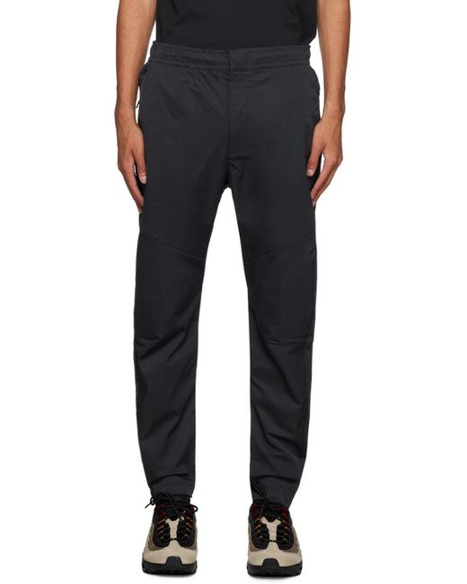nike woven commuter trousers