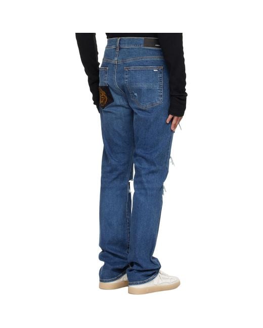 Amiri Blue Floral Velvet Slim Thrasher Jeans for men
