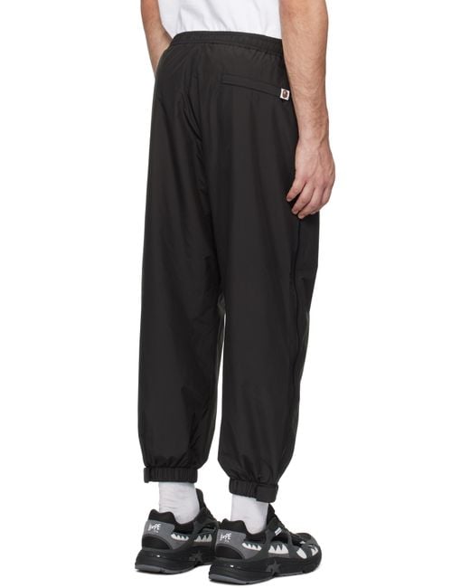 A Bathing Ape Black Color Camo Deformation Track Pants for men