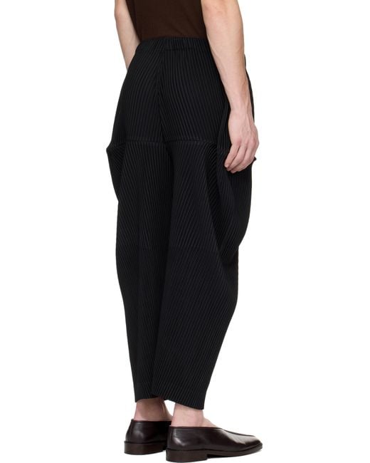 Homme Plissé Issey Miyake Kinetic Sculpture Trousers in Black for
