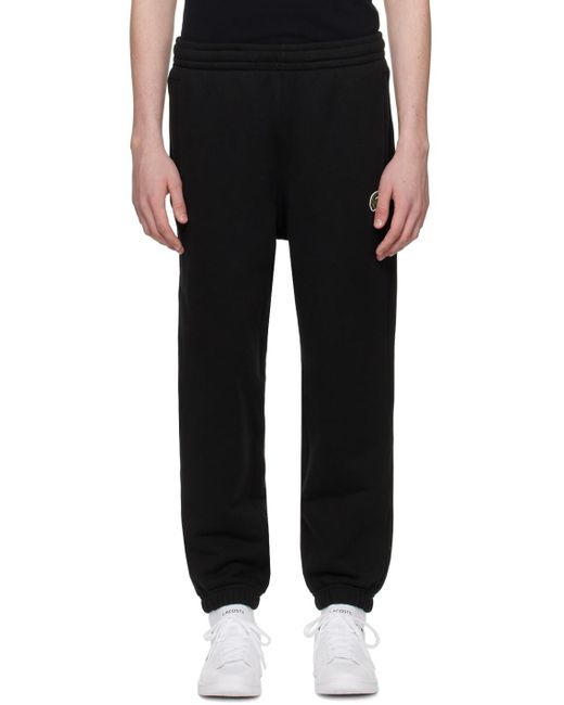 Pantalon de survêtement noir à écussons à logo Lacoste pour homme en coloris Black