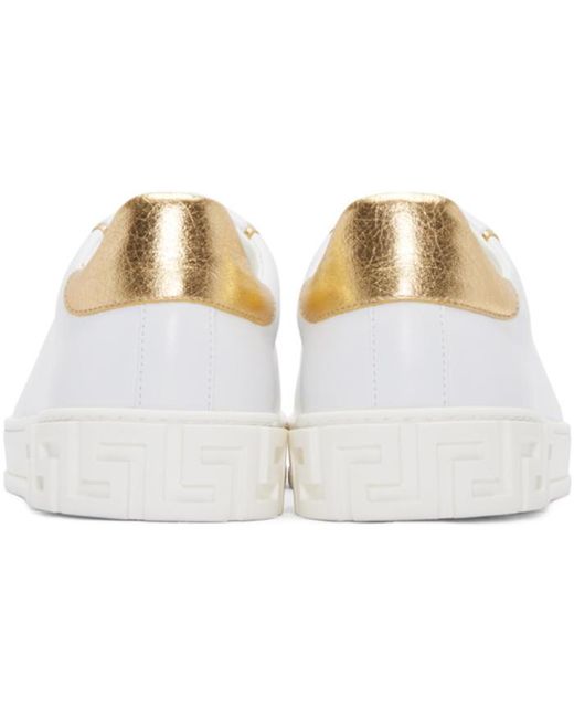 Versace white clearance and gold sneakers